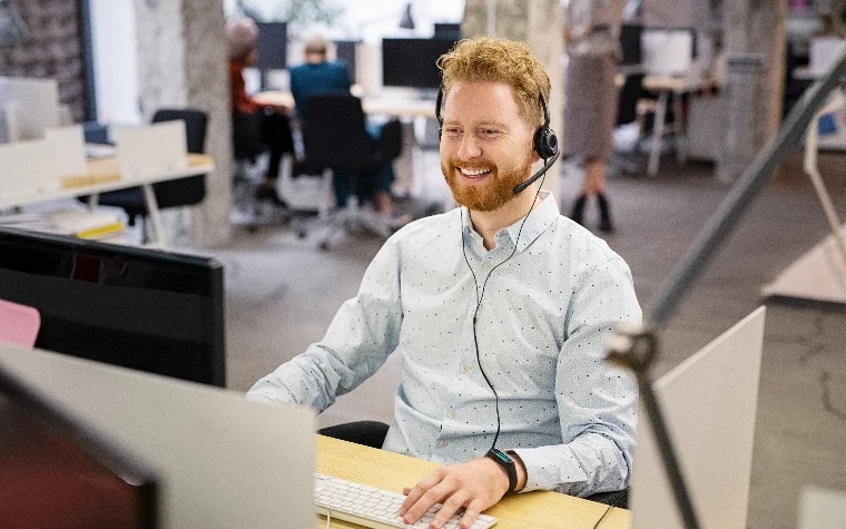 Sales manager reviewing training results on a dashboard