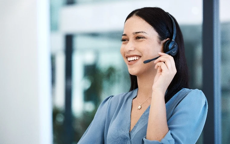 New sales hire on a coached call with a headset