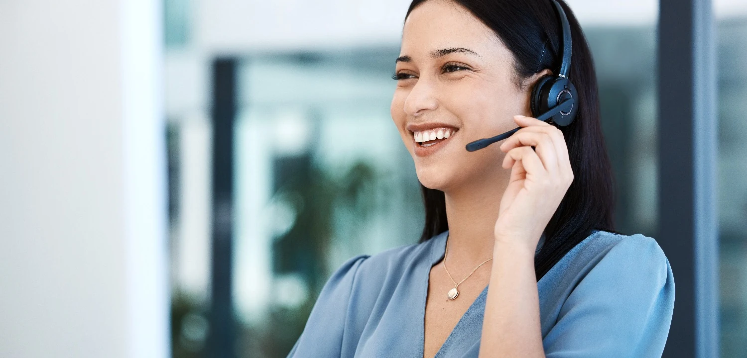 New sales hire on a coached call with a headset