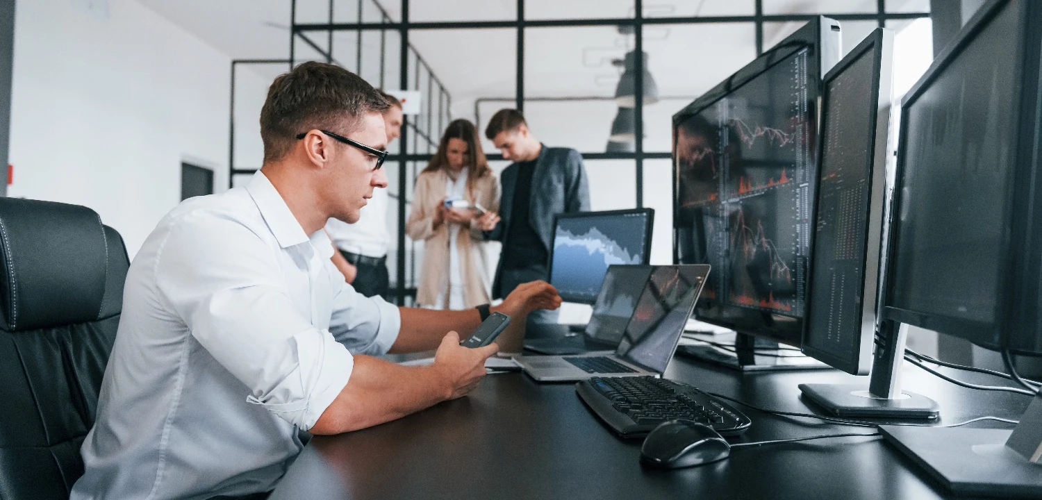 Sales team reviewing performance data in a modern office